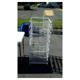 Metal shelf on wheels, measures 21 inches long,