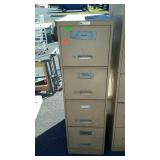 Four drawer metal filing cabniet, measures 27