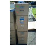 Metal 5 drawer filing cabinet, measures 27 inches