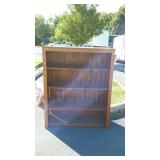 Wooden book shelf, does have spindles going