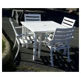 White metal patio table, with four chairs