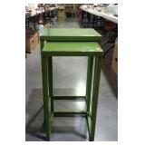 Nesting tables, metal legs with laminate tops.