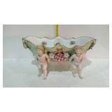 Cherub footed center console bowl.
