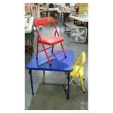 Kids folding table and chairs in primary colors.