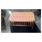 Bench with woven top and slat under shelf -