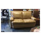 Beige vinyl love seat - 64" long