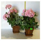 Two artificial potted geraniums