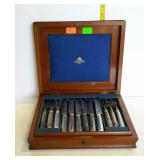 Silver chest with etched silver plated flatware -