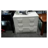 White laminated three drawer dresser- 32 x 20 x 27