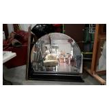 Round bevel edge dresser mirror with dark finish
