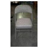 Folding metal chair with padded upholstered seat &