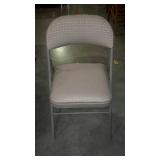 Folding metal chair with padded upholstered seat &