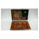 Two wooden 3-D wall plaques