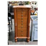 Jewelry armoire with oak finish and fluted column