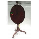 Tilt top table - mahogany finish, pedestal base