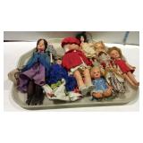 Dolls - tray lot of seven vinyl & plastic - one is
