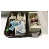Dolls, two porcelain clowns, one plastic doll