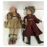 Two dolls - one with cloth body and peasent outfit