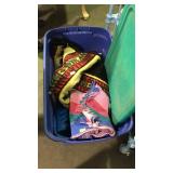 Storage tote with lap blankets, and a few scatter