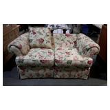 Floral love seat, measures 74 inches long, is