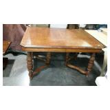 Gate legged dining room table, measures 54 inches