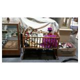 Baby cradle & dolls - three porcelain, one bed