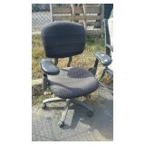Office swivel chair. Shows wear.