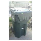Large wheeled trash collection bin. Used