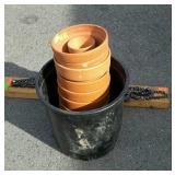 Group of flower pots and chain saw chains