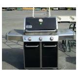Weber Genesis propane grill with side tables and