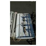 Skid with commercial light fixture, and 4
