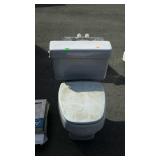 Porcelain toilet and tank with seat & lid