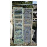 Two wooden shutters, measure 17 inches wide, by