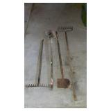 Tool lot, two hard rakes, a scrapper and a shovel