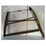 Buck saw, duct tape appears to be for cushioning,
