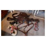 Leather western saddle with breast strap,
