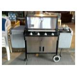 Five burner propane grill, made by Webber