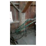 Push plow has tape on handles