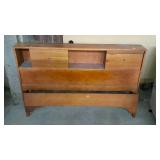 Full size wooden bed, with no rails