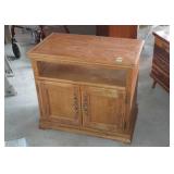 Media cabinet, oak finish with open secondary