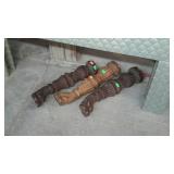 Three wooden table legs, decor carved with the