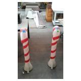 Two light up candy canes for Christmas, seller