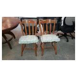 Two sturdy kitchen chairs with chair pads, good