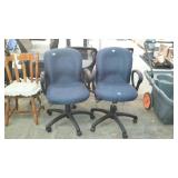 Two office chairs with blue upholstery, with