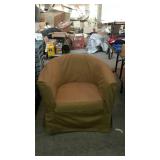 Barrel back style chair with beige slip cover -