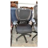Office chair with adjustable height and mesh back