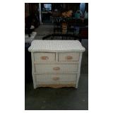 Wicker dresser, two over two with serpentine top