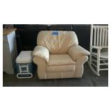 Beige overstuffed chair. Needs wiped down, but n