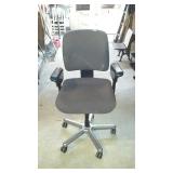 Desk chair, with arms and grey fabric seat and