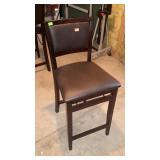 Upholstered folding bar stool. 24" seat height.